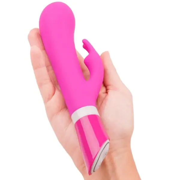 B SWISH - Vibrador rabbit Bwild Deluxe con estimulación clitorial en color frambuesa