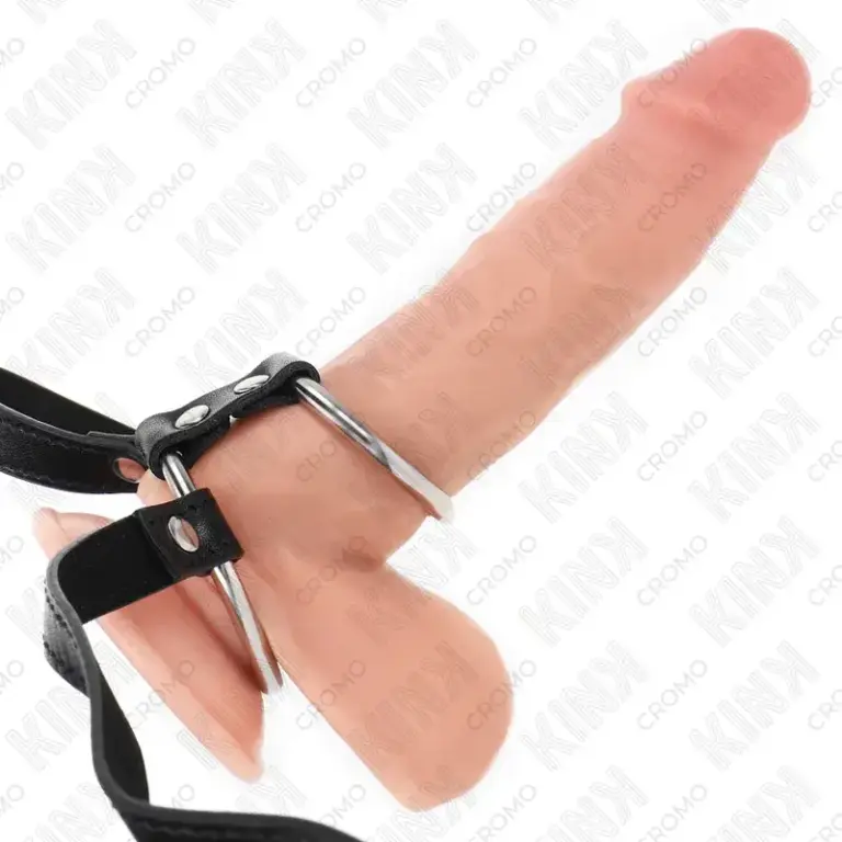 KINK - Anillo pene doble de metal con cinturón de polipiel para un placer intenso