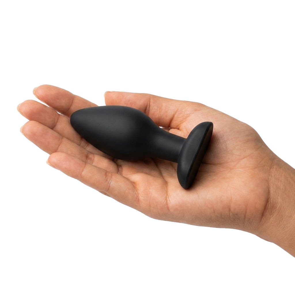 Plug anal de silicona en mano — juego anal para iniciarse